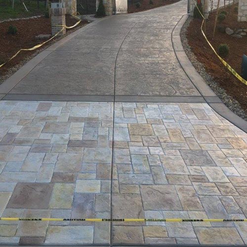 A walkway with a lot of different colored tiles